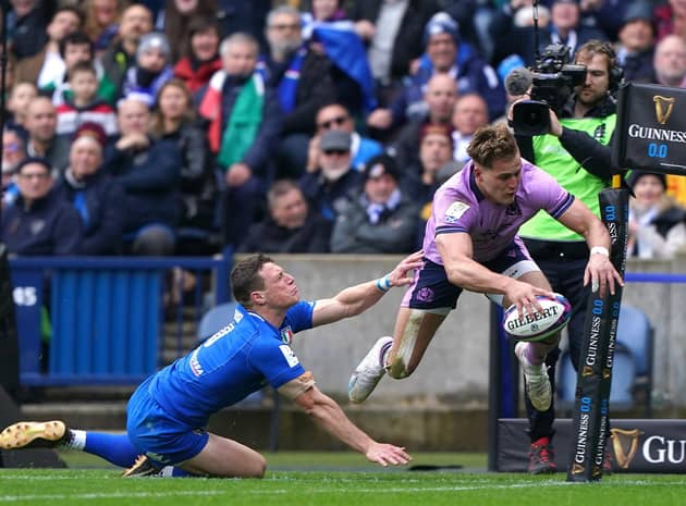 Duhan van der Merwe is airborne as scores his spectacular try against Italy.  Picture: Andrew Milligan/PA Images