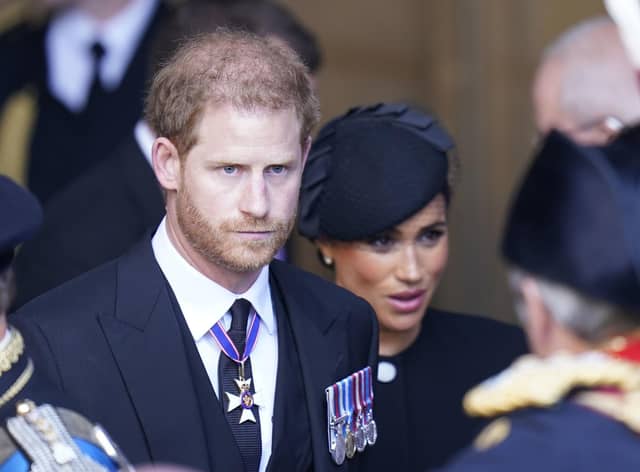 Prince Harry, with Meghan, Duchess of Sussex, leaves Westminster Hall, London after the coffin of Queen Elizabeth II was brought to the hall to lie in state ahead of her funeral on Monday. Picture: Danny Lawson - WPA Pool/Getty Images