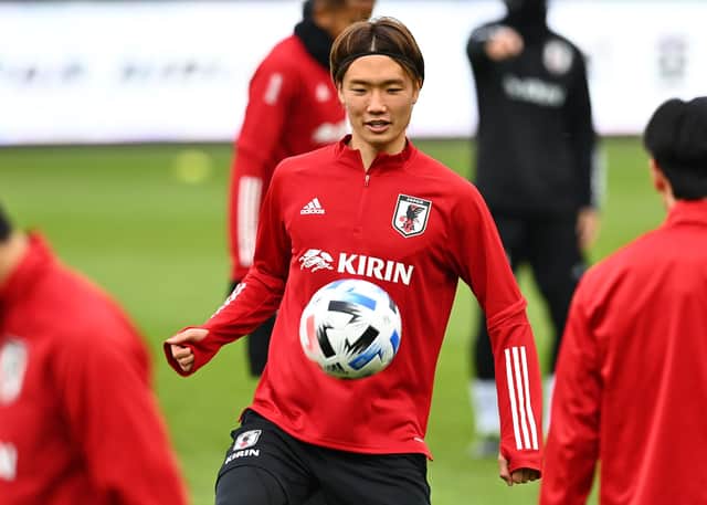 Ko Itakura takes part in a training session ahead of a friendly match between Japan and Panama in Austria