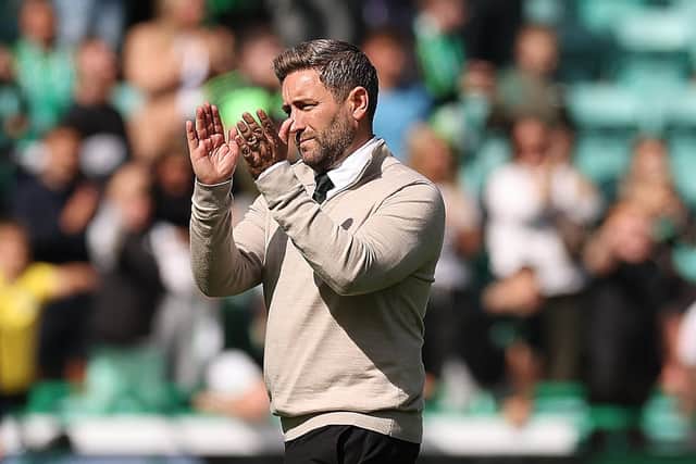 Lee Johnson applauds the Hibs fans after the 2-2 draw against Rangers.