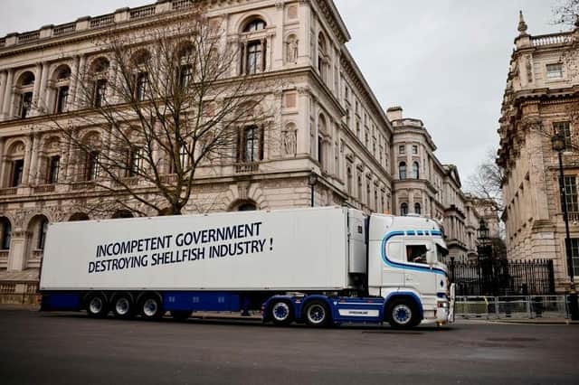 A lorry carrying a protest driving through London