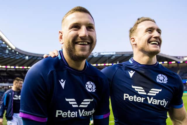 Finn Russell (left) and Stuart Hogg celebrate the win over Australia at BT Murrayfield on Sunday. (Photo by Ross Parker / SNS Group)