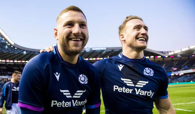 Finn Russell (left) and Stuart Hogg celebrate the win over Australia at BT Murrayfield on Sunday. (Photo by Ross Parker / SNS Group)