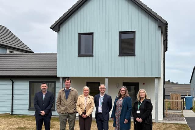 Albyn senior leadership and Angus MacDonald MP visit one of the homes in Broadford, Isle of Skye