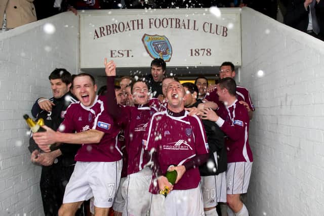 Paul Sheerin (right) leads his teams celebrations after winning the IRN-BRU SFL Third Division in 2011 (Picture: SNS)