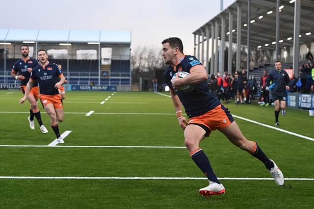 Emiliano Boffelli runs through to score Edinburgh's second try against Cardiff. (Photo by Paul Devlin / SNS Group)