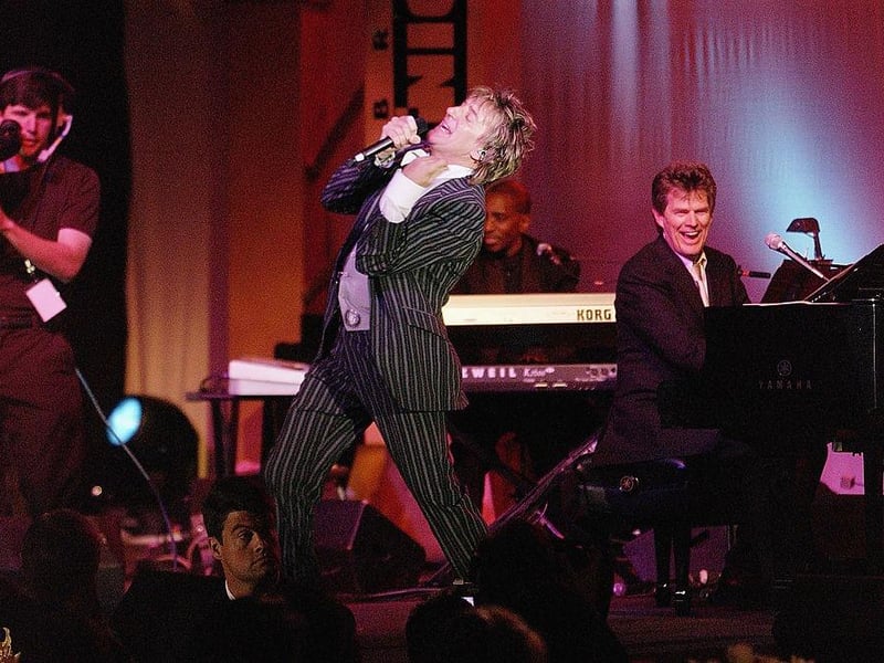 "I don't think people expect Bruce Springsteen to come out in a pink satin jacket, but Rod Stewart, they do. And I like doing it; I don't wear it just because I think I have to. I'm a very flamboyant person."