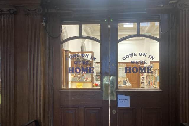 Welcoming doors greet members of the public keen to explore the treasures of the library.