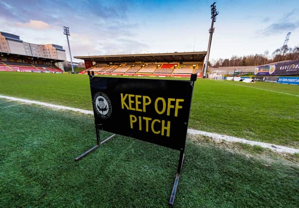 An empty Firhill Stadium where Partick Thistle will be playing League 1 football next season if the SPFL resolution passes.
