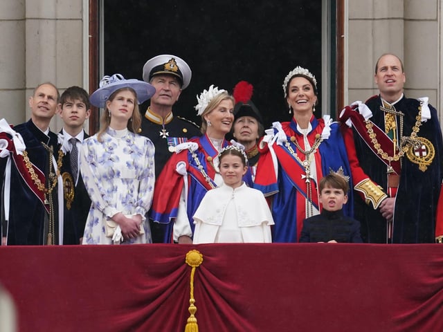 (left to right) the Duke of Edinburgh, the Earl of Wessex, Lady Louise Windsor, Vice Admiral Sir Tim Laurence ,the Duchess of Edinburgh, the Princess Royal, Princess Charlotte, the Princess of Wales, Prince Louis, the Prince of Wales on the balcony of Buckingham Palace, London, to view a flypast by aircraft from the Royal Navy, Army Air Corps and Royal Air Force - including the Red Arrows, following their coronation.
