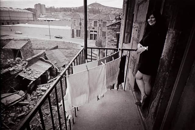 A woman and her whites as demolition edges nearer. Newlook Dundee 1972, from Hawkhill: Death of a Living Community, by Joseph McKenzie.  © The Joseph McKenzie Archive.