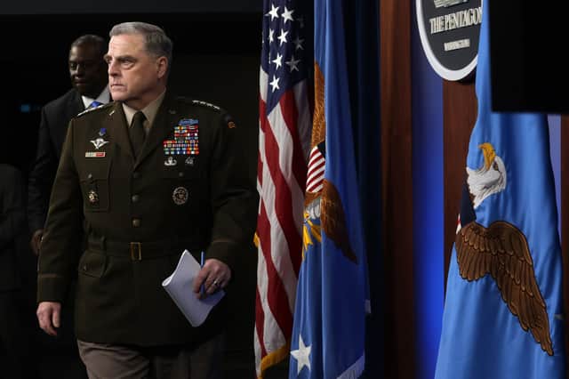 Gen. Mark Milley arrives at a news briefing at the Pentagon