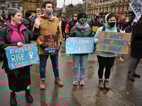 Campaigners attend a rally in George Square in protest against the rising cost of living.