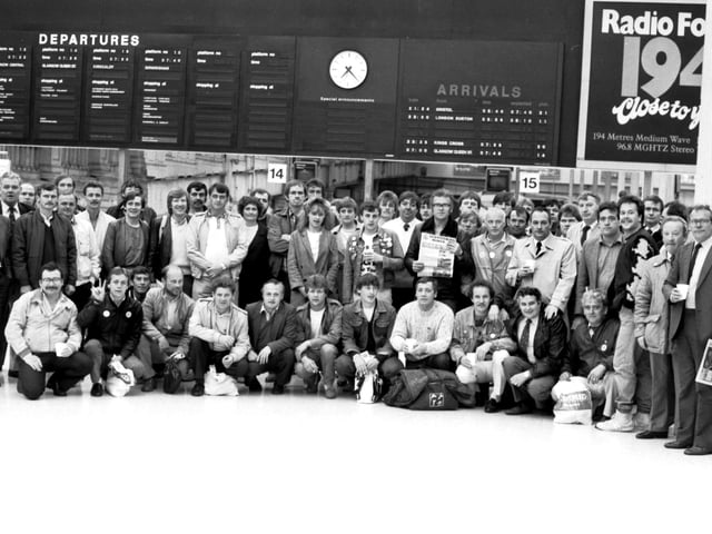 Some of the 300+ miners sacked by British Coal (NCB) during the miners' strike of 1984/85 meet at Waverley station in Edinburgh on their way to London to lobby their MPs on their 'unfair dismissal' in June 1985.