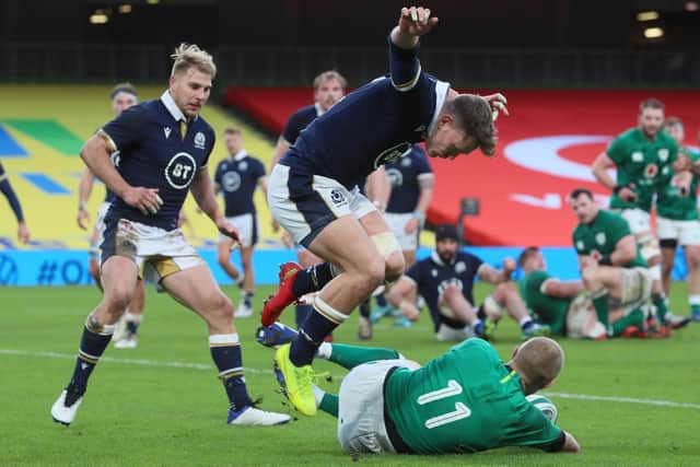 Ireland's wing Keith Earls scores a try against Scotland.