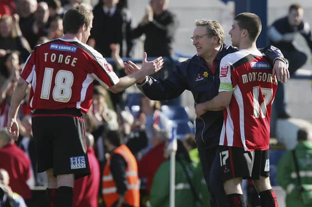 Nick Montgomery and Neil Warnock celebrate during a Sheffield United match back in 2006.