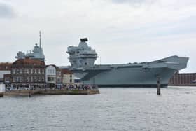 Royal Navy aircraft carrier HMS Prince of Wales returns to Portsmouth Naval Base after breaking down off the Isle of Wight