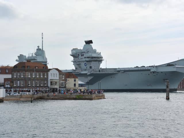 Royal Navy aircraft carrier HMS Prince of Wales returns to Portsmouth Naval Base after breaking down off the Isle of Wight