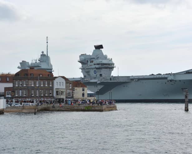 Royal Navy aircraft carrier HMS Prince of Wales returns to Portsmouth Naval Base after breaking down off the Isle of Wight