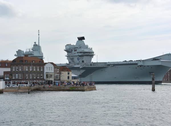 Royal Navy aircraft carrier HMS Prince of Wales returns to Portsmouth Naval Base after breaking down off the Isle of Wight