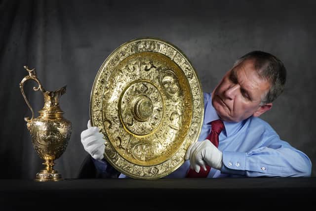Dr Godfrey Evans, of National Museums Scotland, with the Panmure ewer and basin from the Earl of Dalhousie. PIC: Stewart Attwood/National Museums Scotland/PA Wire.