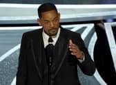 Will Smith cries as he accepts the award for best performance by an actor in a leading role for "King Richard" at the Oscars on Sunday, March 27, 2022. (Image credit: AP Photo/Chris Pizzello)