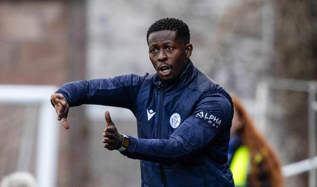 Marvin Bartley gives instructions during Queen of the South's Viaplay Cup match against Motherwell.