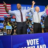 Gubernatorial candidate Wes Moore, US President Joe Biden, US First Lady Jill Biden and US Senator Chris Van Hollen acknowledge the crowd during a rally on the eve of the US midterm elections, at Bowie State University in Bowie, Maryland.