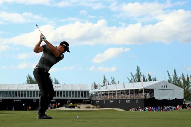 Henrik Stenson of Sweden hits is approach shot on the 18th hole during the final round of the Hero World Challenge at Albany on December 07, 2019 in Nassau, Bahamas.