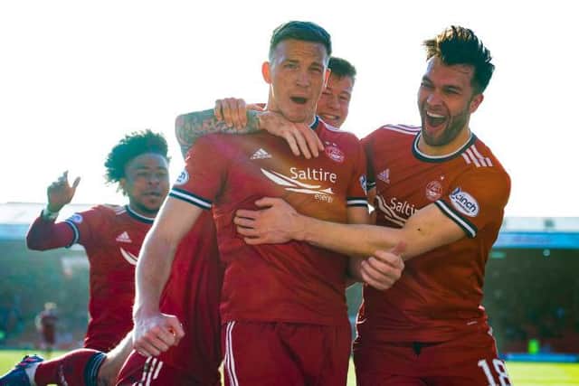 Lewis Ferguson celebrates after scoring to make it 2-1 during a cinch Premiership match between Aberdeen and Hibs.  (Photo by Craig Foy / SNS Group)