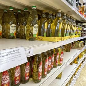 Here, cooking oil is limited on shelves in a Sainsbury's store in Kent. Photo: Gareth Fuller/PA Wire