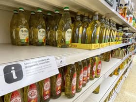Here, cooking oil is limited on shelves in a Sainsbury's store in Kent. Photo: Gareth Fuller/PA Wire
