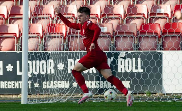 Ben Doak celebrates as he scores for Liverpool to make it 4-3 during a UEFA Youth League match between Rangers and Liverpool at Firhill.