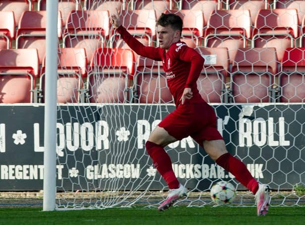 Ben Doak celebrates as he scores for Liverpool to make it 4-3 during a UEFA Youth League match between Rangers and Liverpool at Firhill.