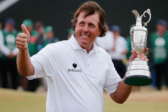 Phil Mickelson holds the Claret Jug after winning the 142nd Open Championship at Muirfield in 2013. Picture: Rob Carr/Getty Images.