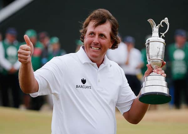 Phil Mickelson holds the Claret Jug after winning the 142nd Open Championship at Muirfield in 2013. Picture: Rob Carr/Getty Images.
