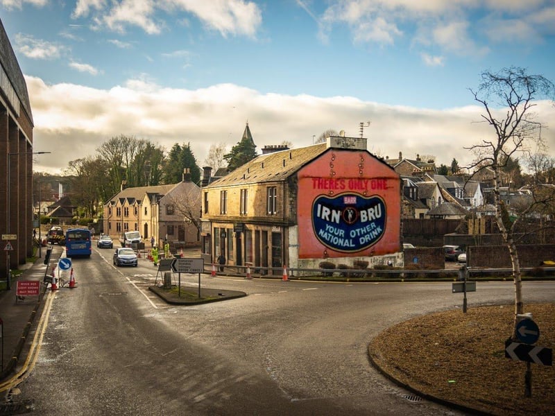 In 2015 an online petition looking to raise support for the restoration of Falkirk’s A.G Barr mural gathered hundreds of signatures. The change.org petition referred to a painting on the gable end of a building next to the former A.G Barr factory on Cockburn Street - marking the town’s 126 year history with the soft drink company, famous for creating the ‘other national drink’ Irn-Bru. The mural was covered up in the mid-1990s, with a billboard currently covering the original site.