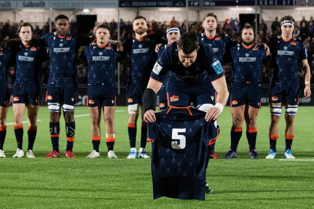 Edinburgh Captain Grant Gilchrist lays the No 5 jersey after the passing of Doddie Weir ahead of the kick-off against Munster.