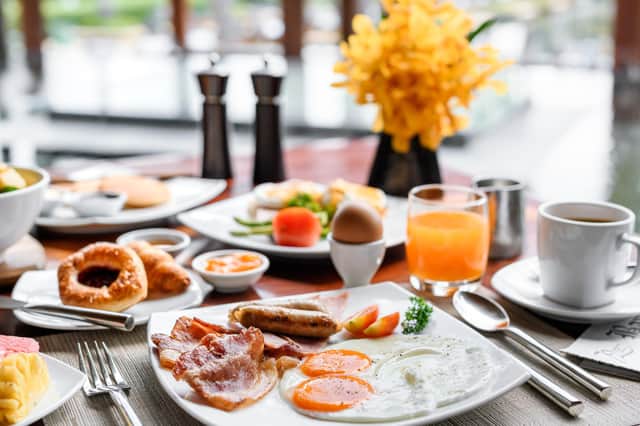Setting of breakfast dishes in hotel restaurant Pic: Adobe