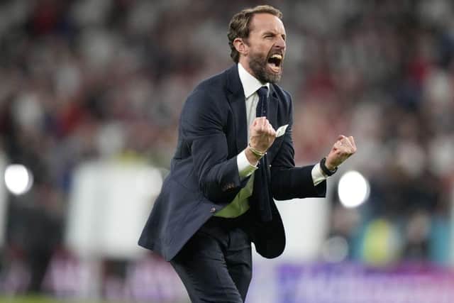 England's coach Gareth Southgate celebrates after winning the UEFA EURO 2020 semi-final against Denmark.  (Photo by FRANK AUGSTEIN/POOL/AFP via Getty Images)