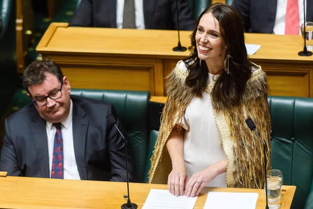 Outgoing New Zealand prime minister Jacinda Ardern gives a speech in parliament in Wellington on April 5, 2023. - Ardern bowed out of parliament on April 5, making an impassioned plea during her tearful final speech to "please take the politics out of climate change". (Photo by Mark Coote / AFP) (Photo by MARK COOTE/AFP via Getty Images)