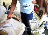 With the NHS under severe pressure, employers could help by improving their occupational health services and doing more to prevent accidents and injuries (Picture: Christopher Furlong/Getty Images)