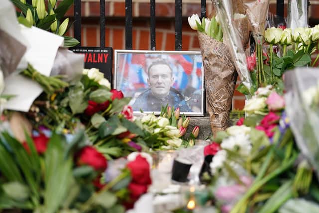 Floral tributes the Russian Embassy in London the Russian Embassy in London, for jailed Russian opposition leader Alexei Navalny who died last Friday. PIC: Jordan Pettitt/PA Wire.