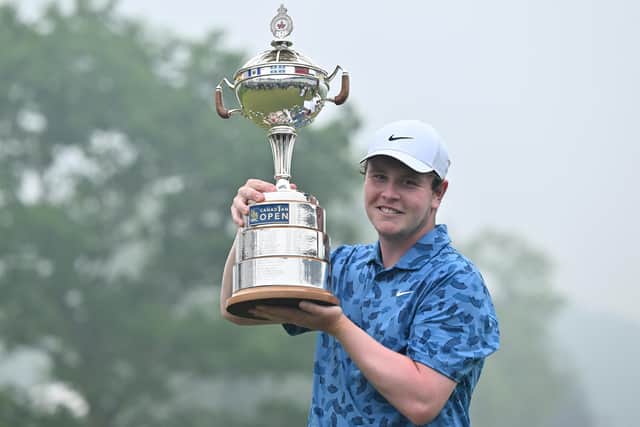 Bob MacIntyre celebrates with the trophy after winning the RBC Canadian Open at Hamilton Golf & Country Club in Ontario. Picture: Minas Panagiotakis/Getty Images.