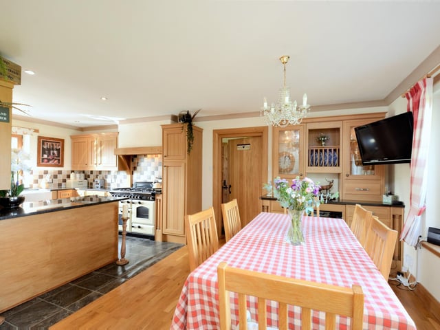 Interior: A large drawing room features a multi-fuel stove, while its impressive lounge benefits from a wood burner. Upstairs are the quartet of generously sized bedrooms, the principal of which is ensuite.