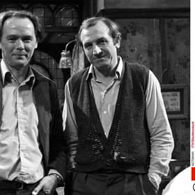 Eric Chappell with star Leonard Rossiter on the Rising Damp set in 1974 (Picture: ITV/Shutterstock)