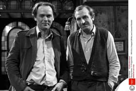 Eric Chappell with star Leonard Rossiter on the Rising Damp set in 1974 (Picture: ITV/Shutterstock)
