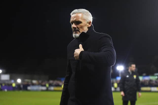 Aberdeen manager Jim Goodwin leaves the pitch after Aberdeen's defeat by Darvel.