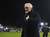 Aberdeen manager Jim Goodwin leaves the pitch after Aberdeen's defeat by Darvel.
