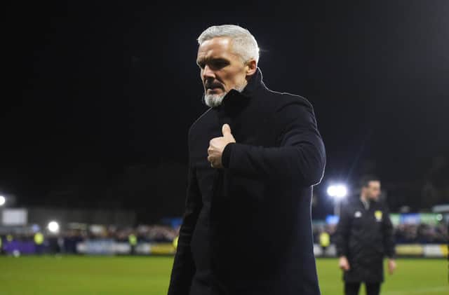 Aberdeen manager Jim Goodwin leaves the pitch after Aberdeen's defeat by Darvel.